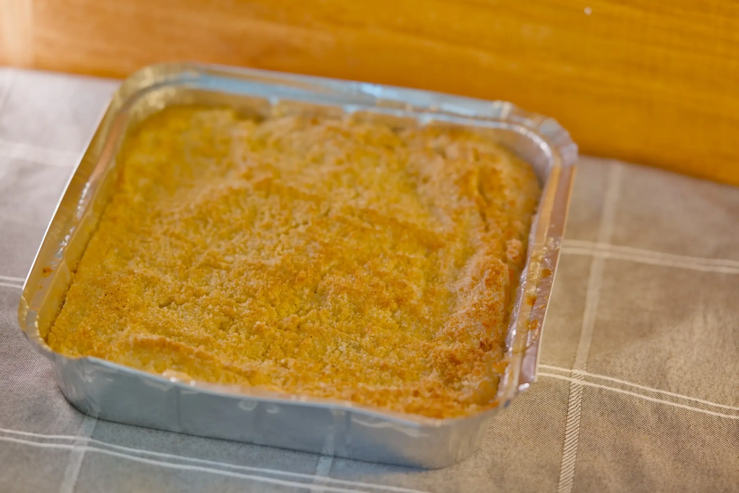 Vegan apple crumble in a baking dish.